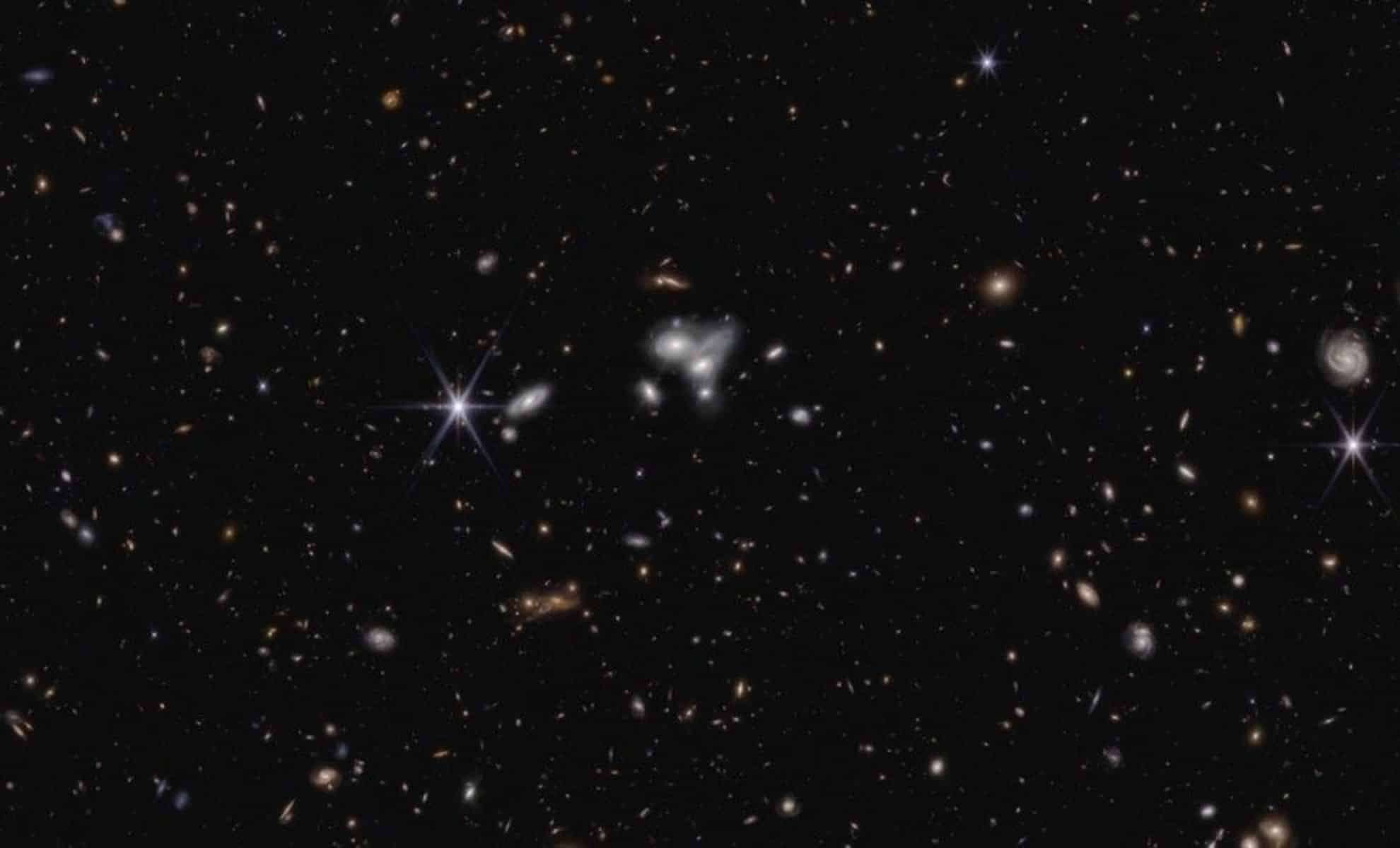 Historic Black Hole Collision Unveiled by James Webb Telescope in Early Cosmos 