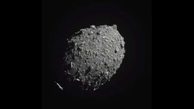 A-gray-rough-rock-in-space.--ed6a2073bad3fa4d749fbbfb89c2f660.jpeg