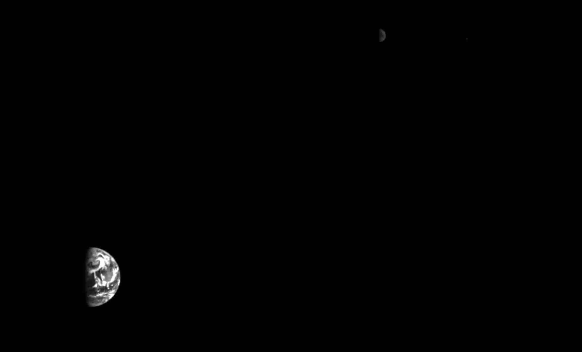 ESA’s Hera Probe Sends Captivating Earth and Moon Photos En Route to Asteroid Duo 