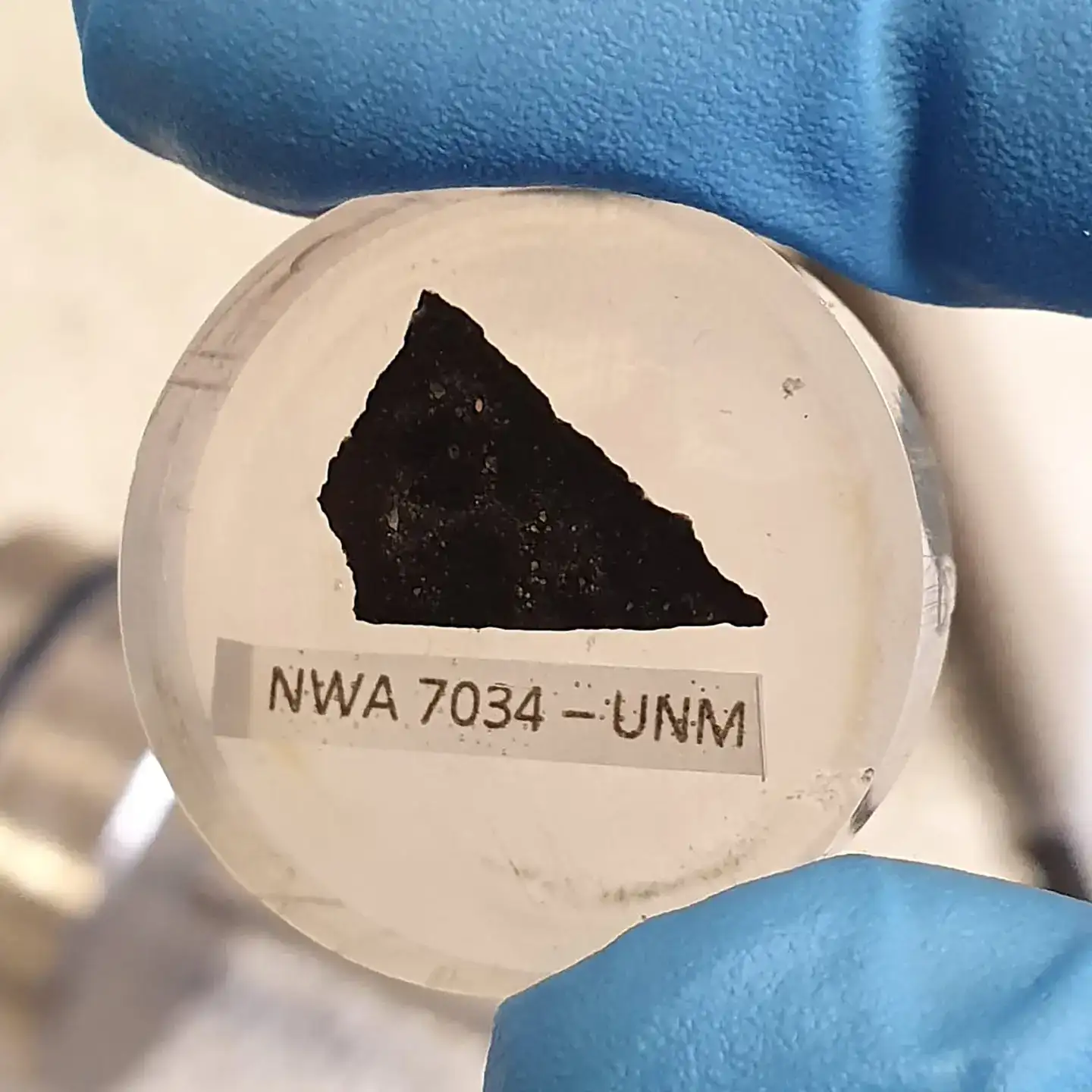 A-sample-of-the-Martian-meteorite-known-as-Black-Beauty.-CREDIT-Curtin-UniversityAaron-Cavosie-9397271fb3b44933ea6ea60e95347317.webp