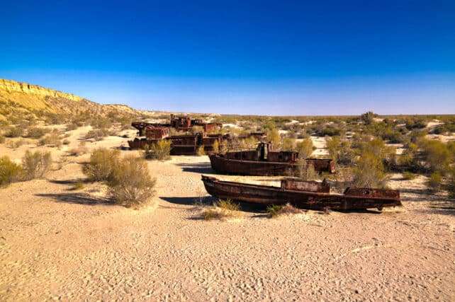 Ship-cemetery-near-Moynaq-Uzbekistan.-HomoCosmicosiStockGetty-Images-Plus-1a79cf8bbfd75101b13ac4333d525137.jpg