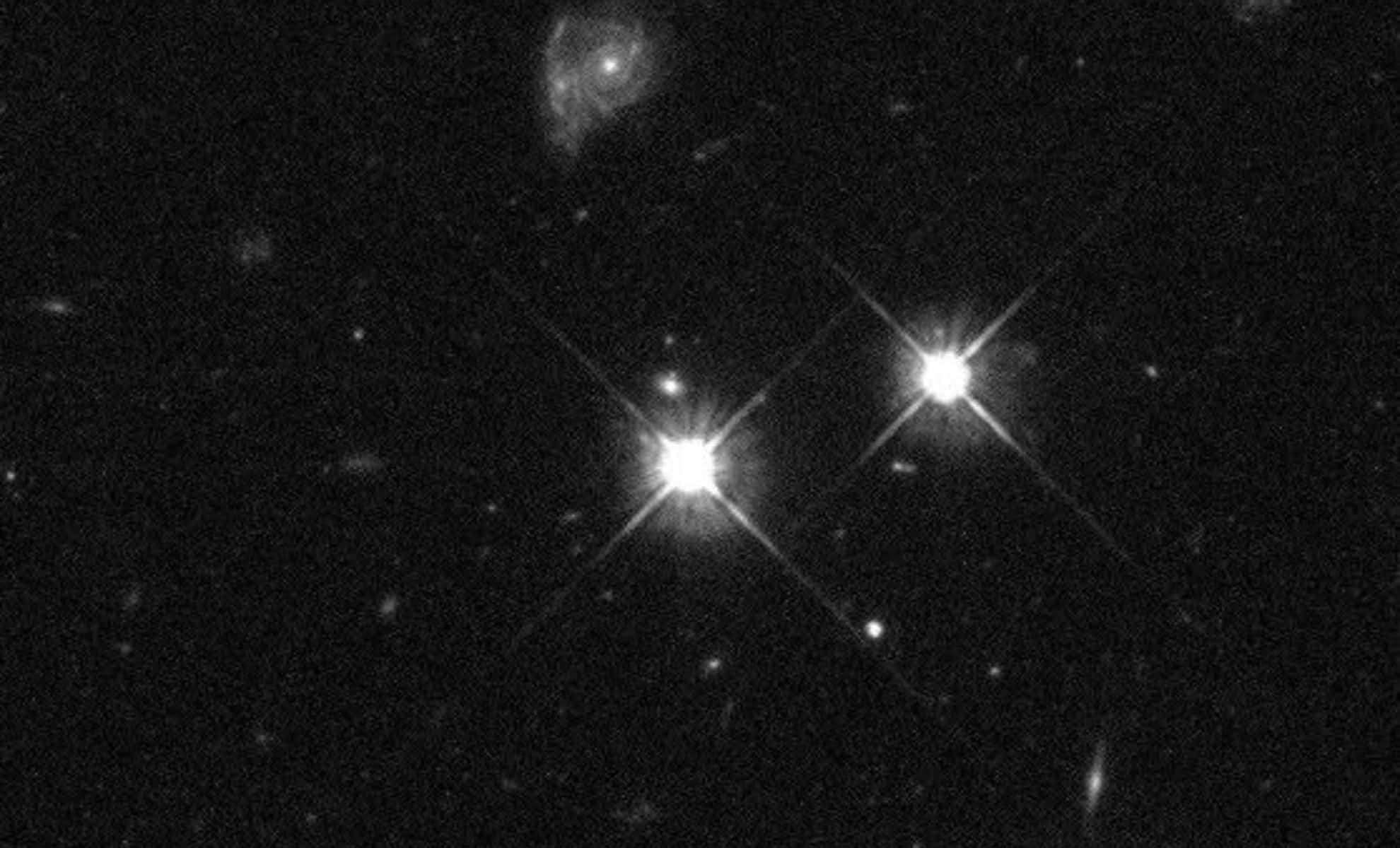 Hubble Celebrates 100,000th Image with Spectacular View of Quasar 9 Billion Light-Years Away 