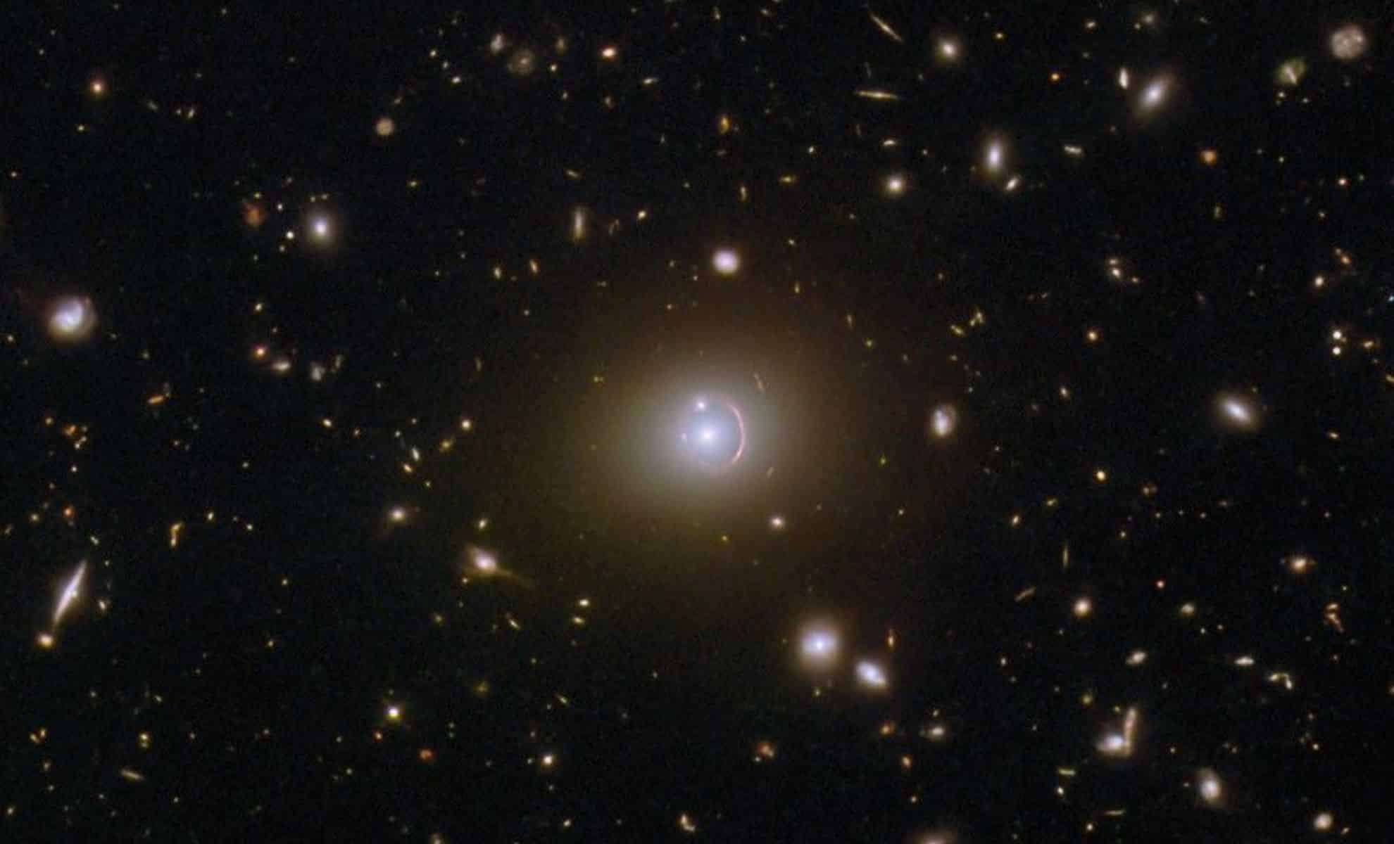 Ancient Galaxy from 11 Billion Years Ago Revealed in Stunning Einstein Ring Formation 