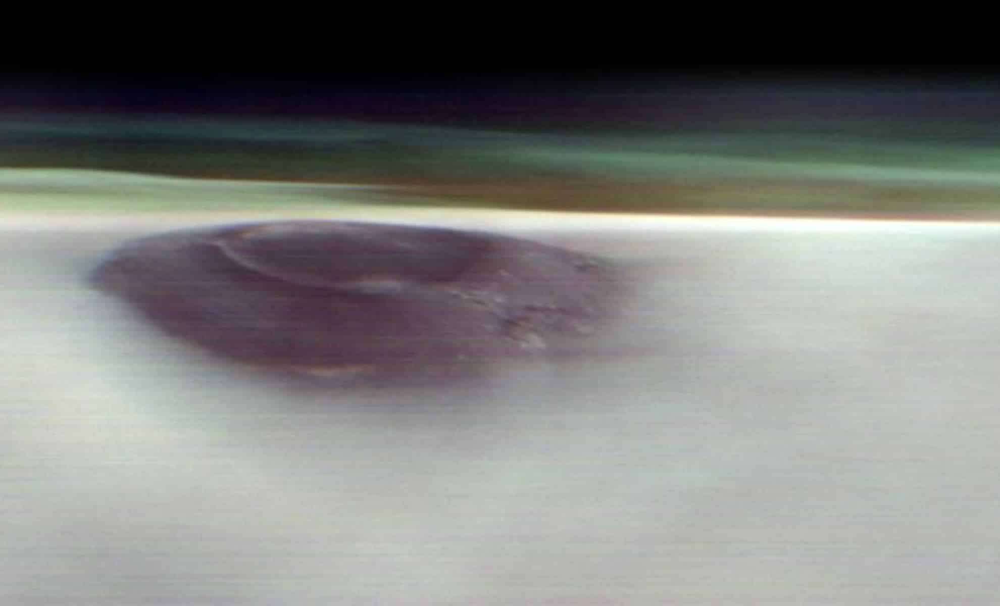NASA Captures Stunning Image of Gigantic Formation Piercing Mars' Morning Clouds 