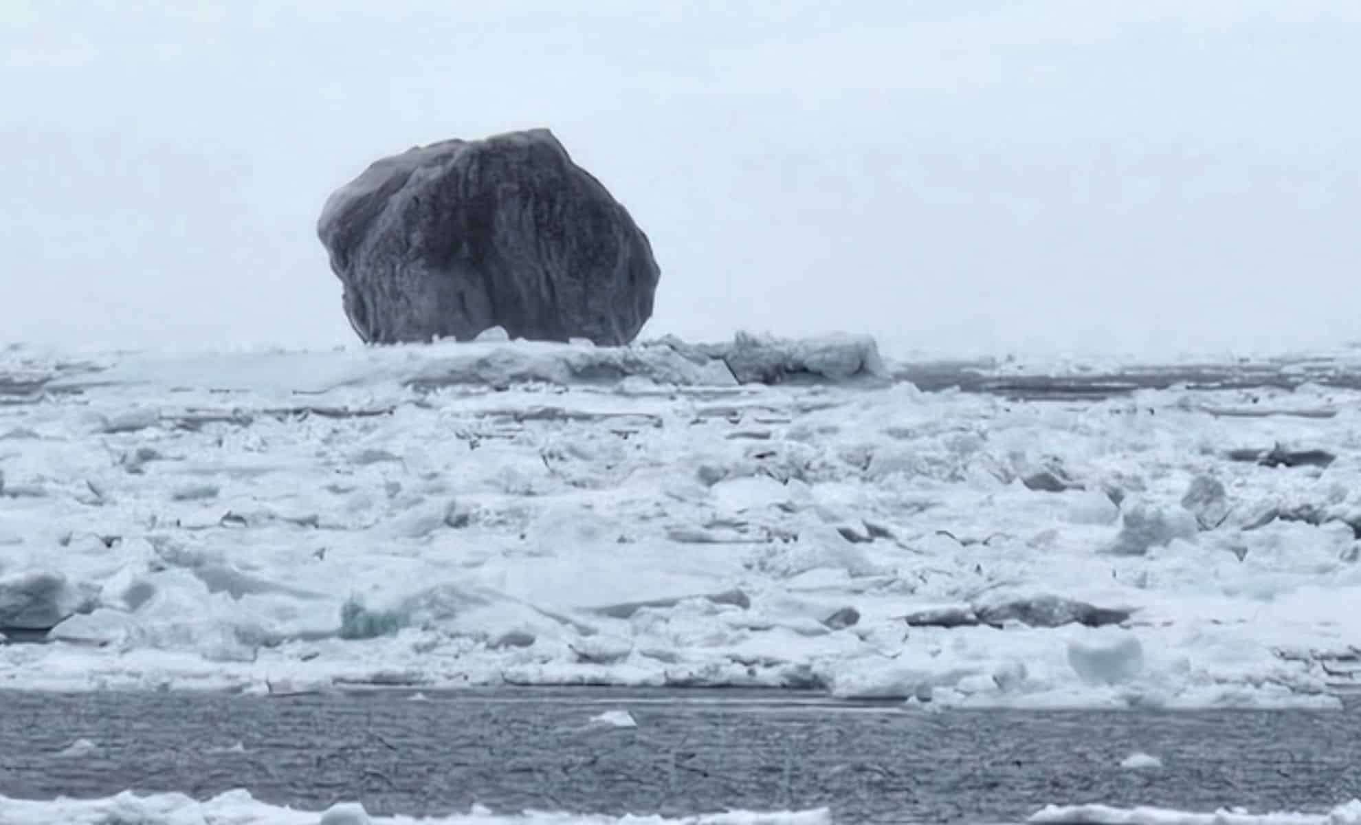 The Mystery Behind a Strikingly Dark Iceberg Captivates Netizens 
