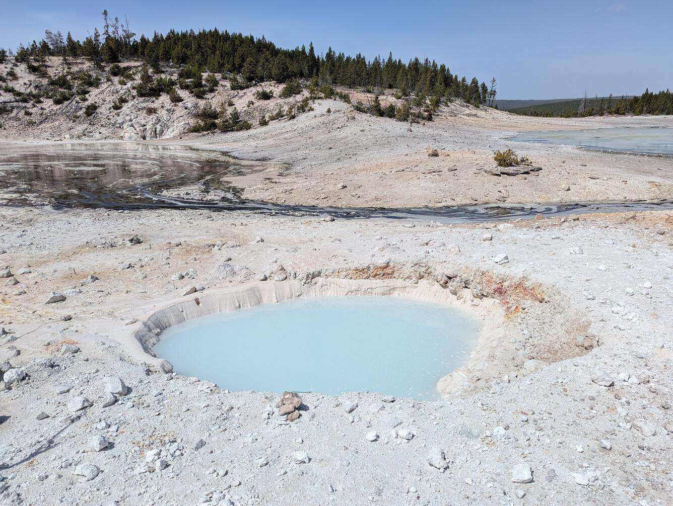 View-looking-northwest-at-a-new-thermal-pool-in-the-Porcelain-Basin-area-of-Norris-Geyser-Basin-aa1b275381771500021fd889a729eecc.jpg