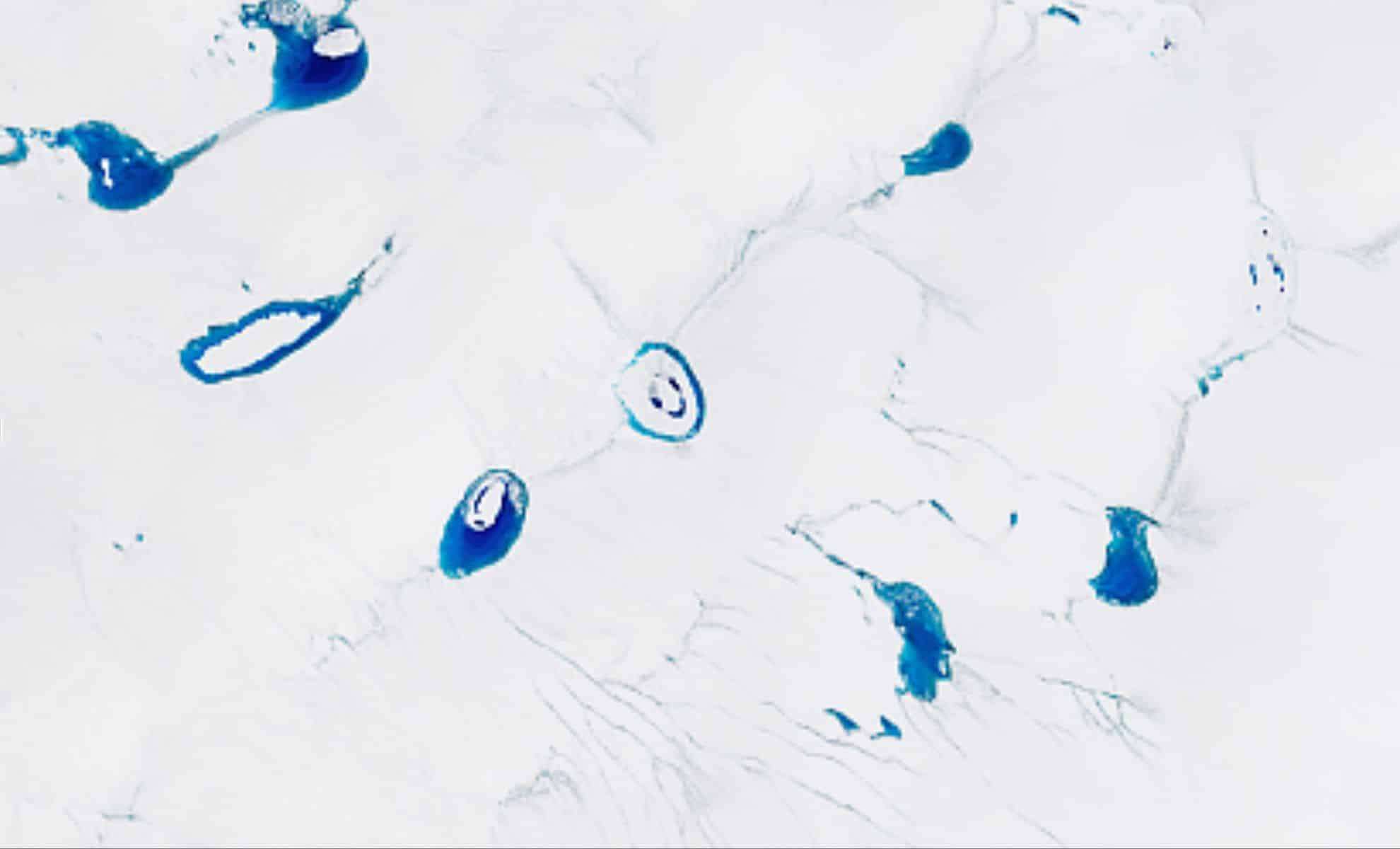 NASA Captures Unique Patterns and Faces in Greenland’s Melting Ice Sheet 