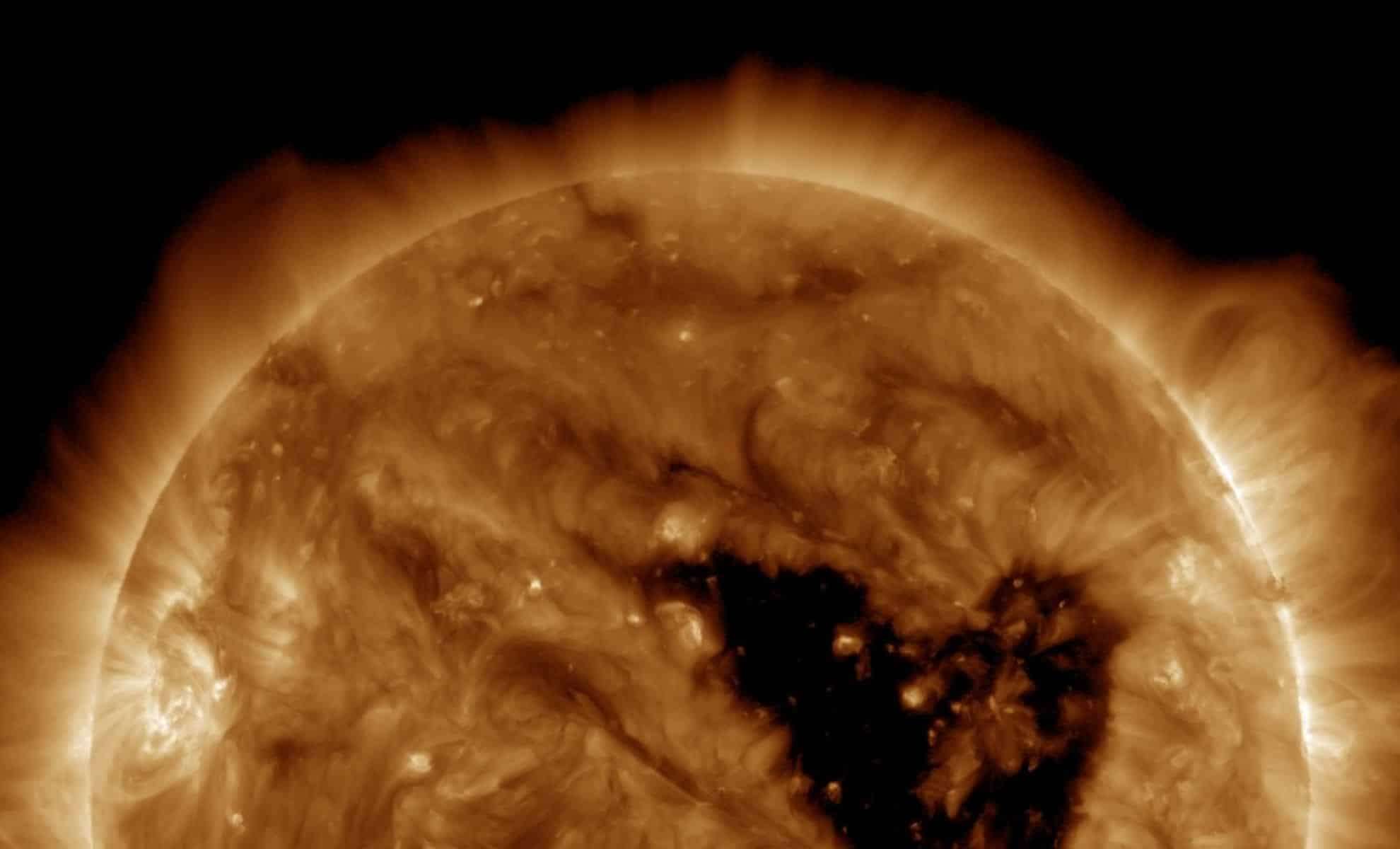 NASA Observes Enormous Heart-Shaped Coronal Hole on Sun Facing Earth 