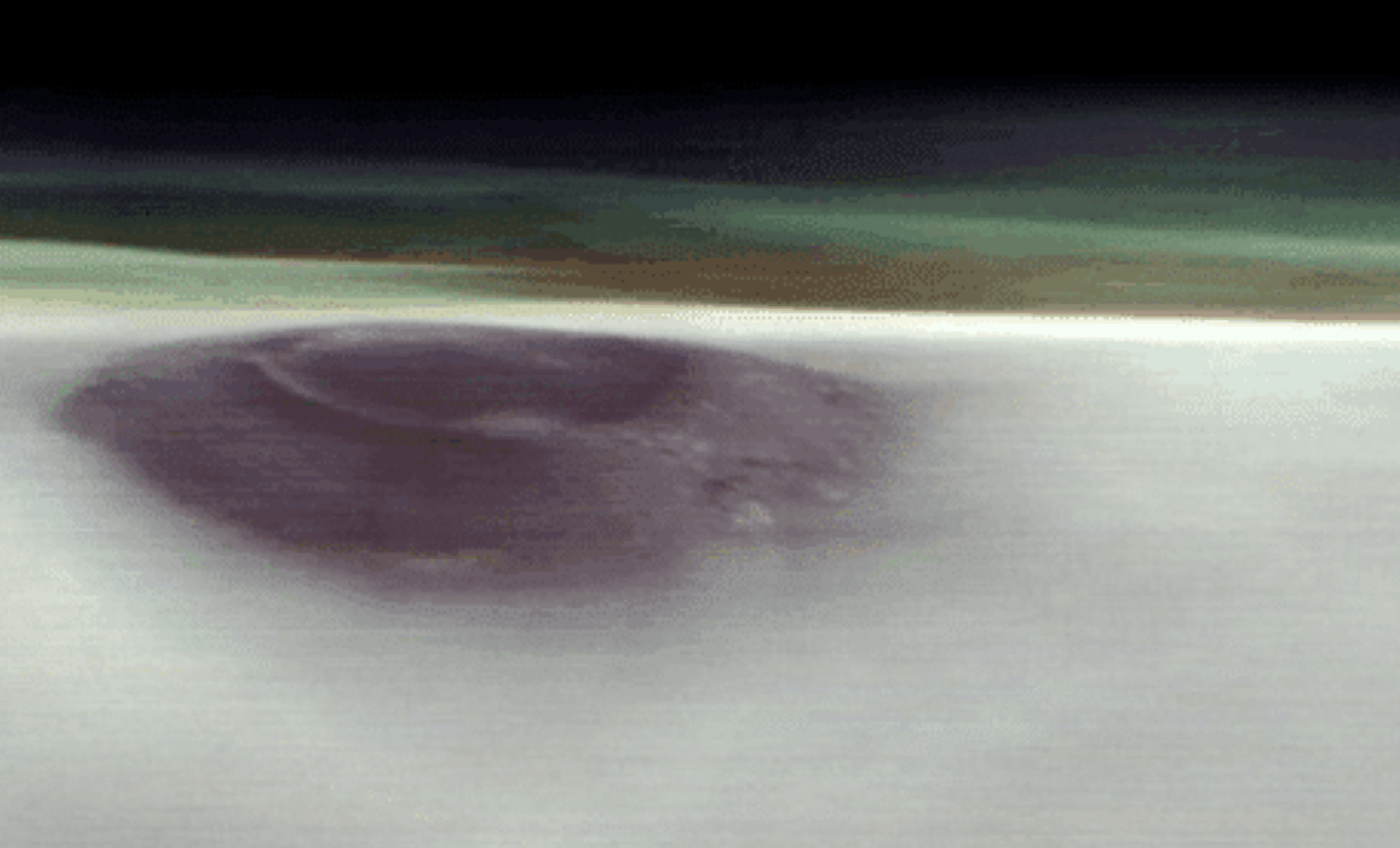 NASA Captures Spectacular View of Massive Volcano Emerging Above Mars’ Clouds 
