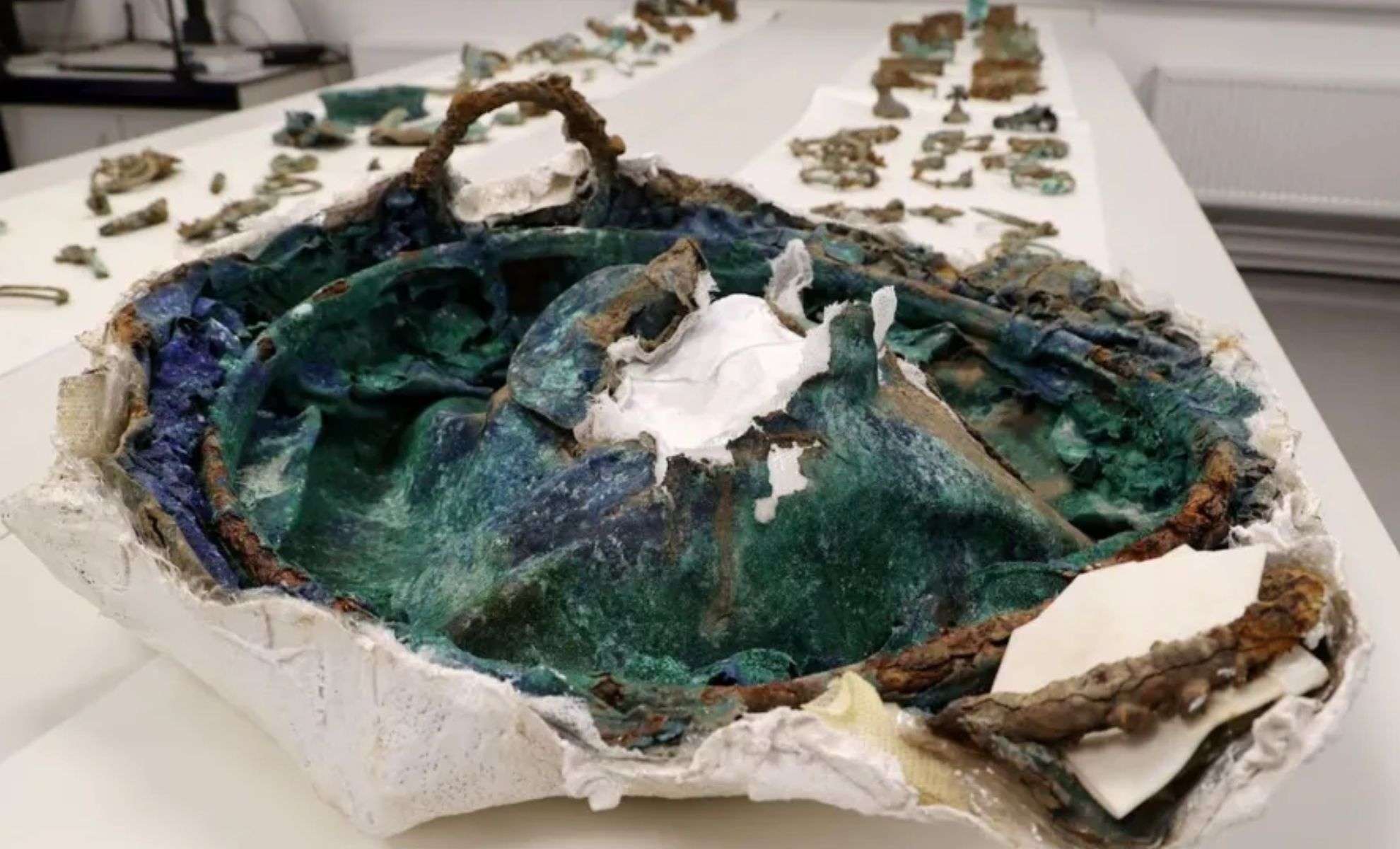 Buried-upside-down-the-cauldron-had-been-deliberately-crushed-by-a-heavy-stone-at-its-center-1b926f612f4092040e2b6436c2e87d0a.jpg
