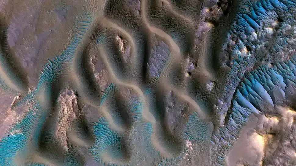 An-artificially-colored-image-depicting-a-dune-field-in-the-Gamboa-Crater-region-of-Mars-a86e78700bcc79b28ce87363b77b17b9.webp