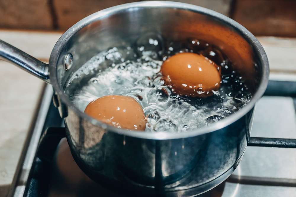 Saucepan-with-boiling-eggs-on-a-gas-stove-da29892f177f5e21744719afb0d4d28b.jpg
