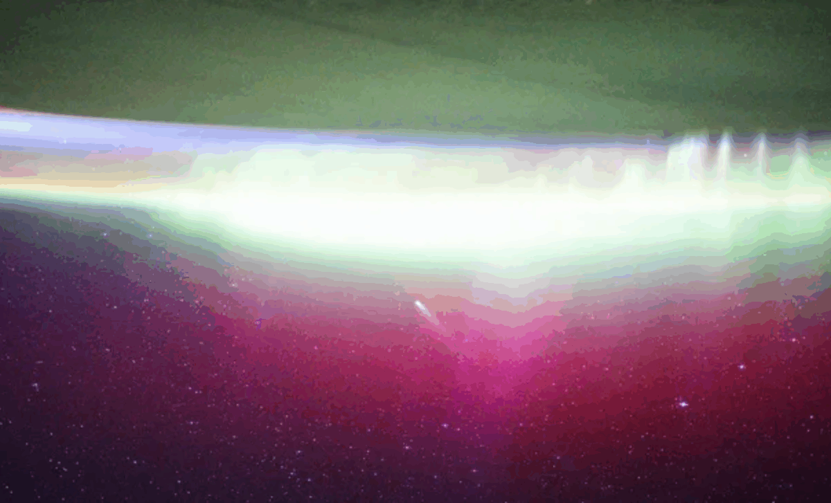 ISS Crew Witnesses Stunning Convergence of Comet Lemmon and Auroral Lights 