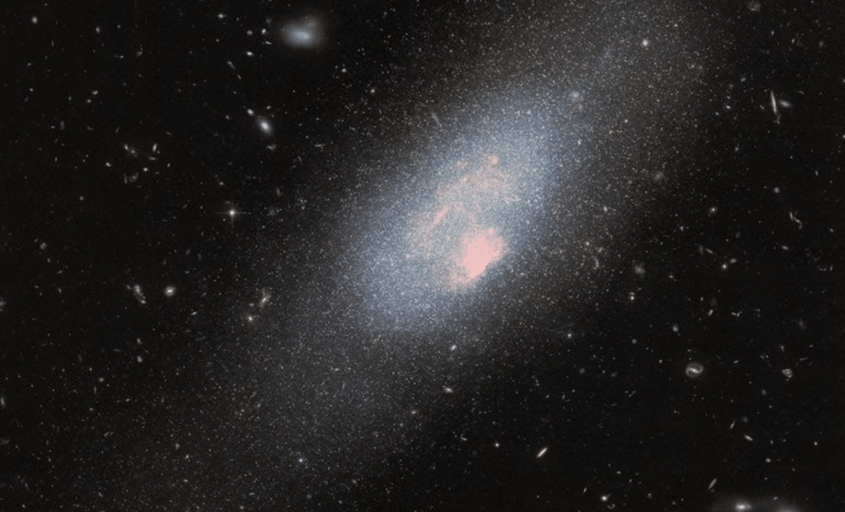 Hubble Reveals Intense Star Formation in Diminutive Galaxy 13 Million Light-Years Away 
