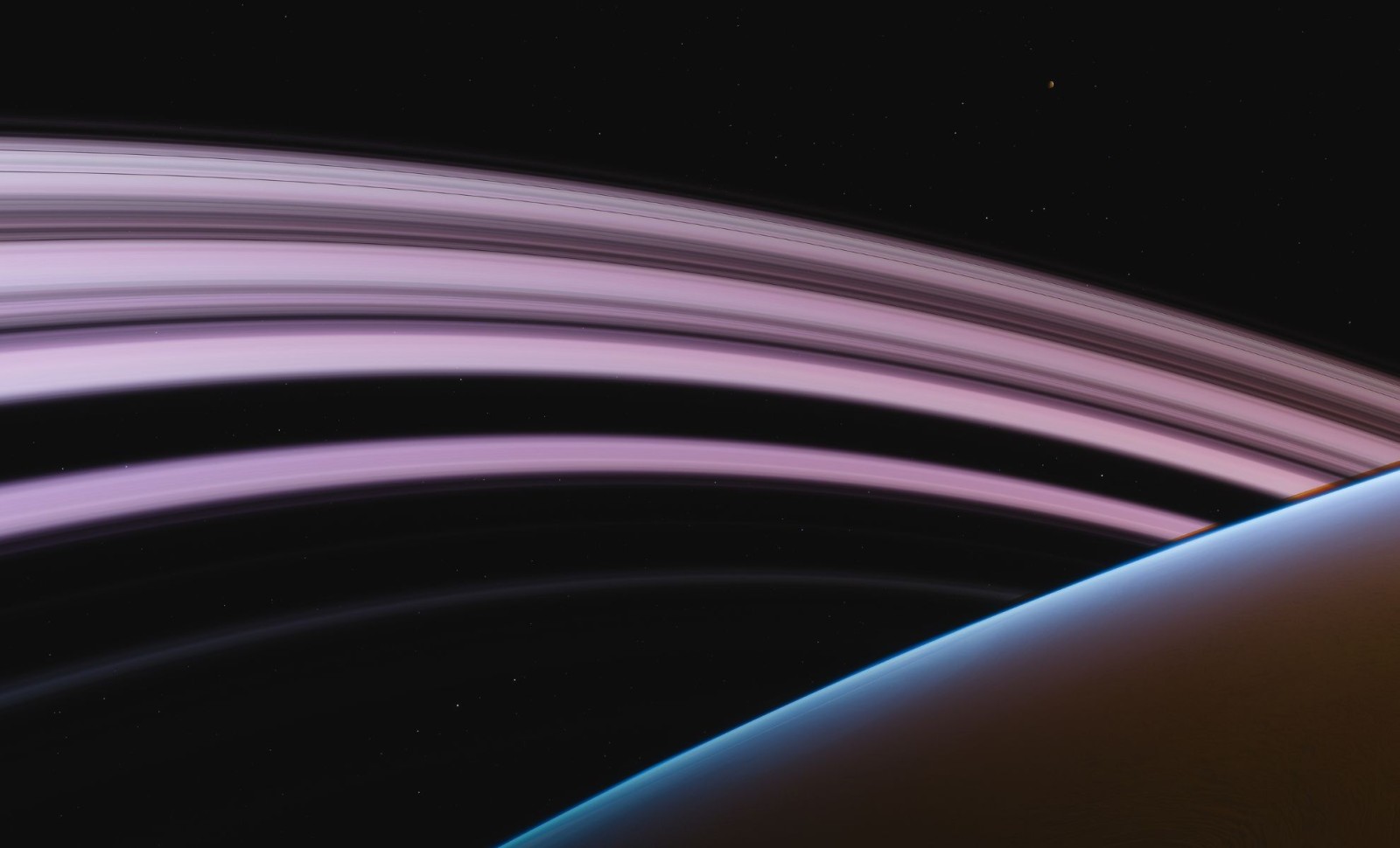 Cassini Uncovers an Extended Dust Halo Enveloping Saturn’s Rings 