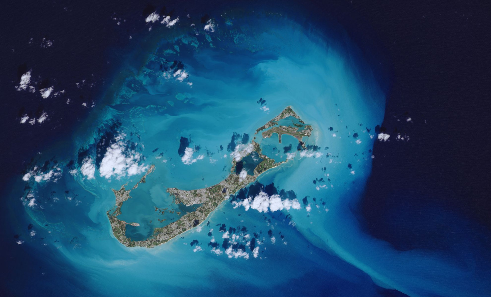 NASA Observes Unusual Oceanic Color Patterns Surrounding Remote Islands 