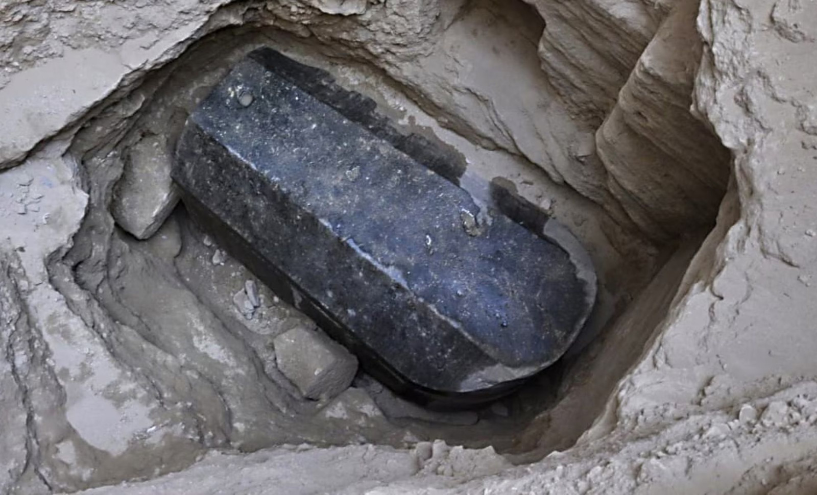 Egyptian Archaeologists Unlock Enormous 27-Ton Black Sarcophagus, Reveal Unexpected Contents 