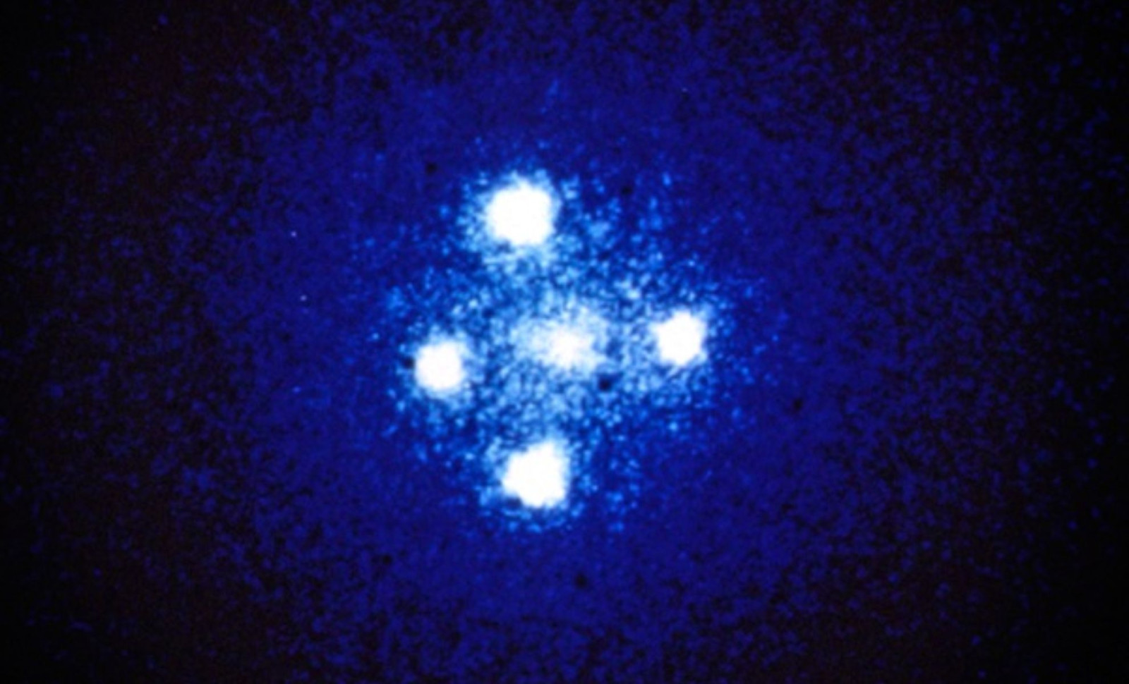 Astronomers Harness Rare ‘Einstein Cross’ to Uncover Mature Stars in an 8-Billion-Year-Old Galaxy 