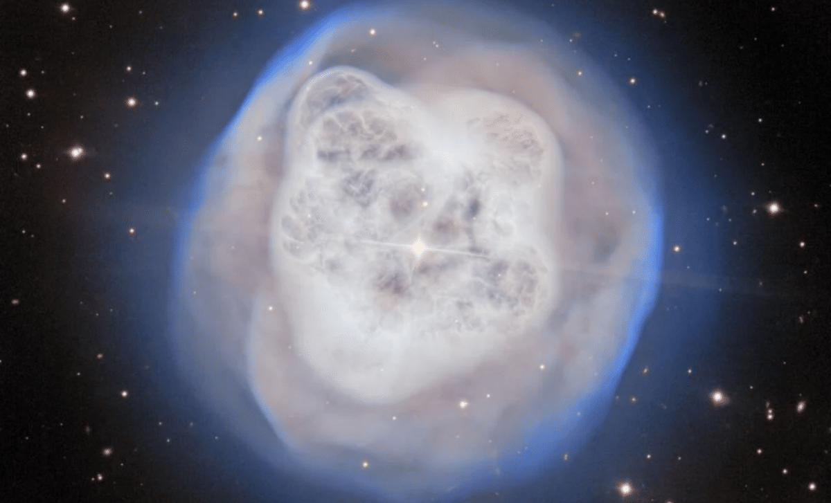 Scientists Reveal the Binary Star Origins of the Crystal Ball Nebula's Stunning Shape 