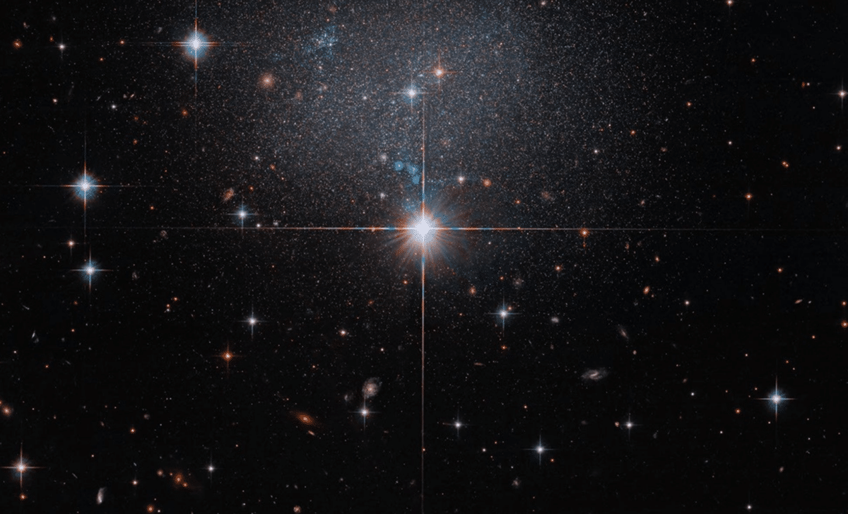 Hubble Uncovers Faint Dwarf Galaxy Illuminating Galactic Movements 