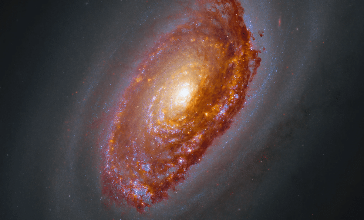 NASA Reveals Striking Image of Galaxy Bearing a Billion-Year-Old Cosmic Scar 