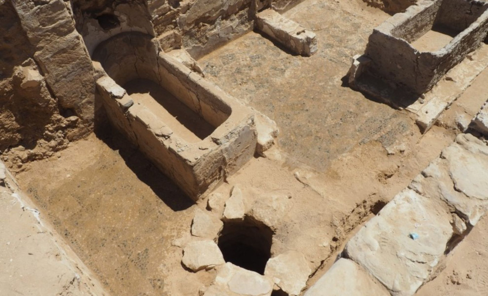 Ancient Coastal Egyptian Tombs Reveal Sealed Granite Sarcophagus and 24 Golden Tongues 