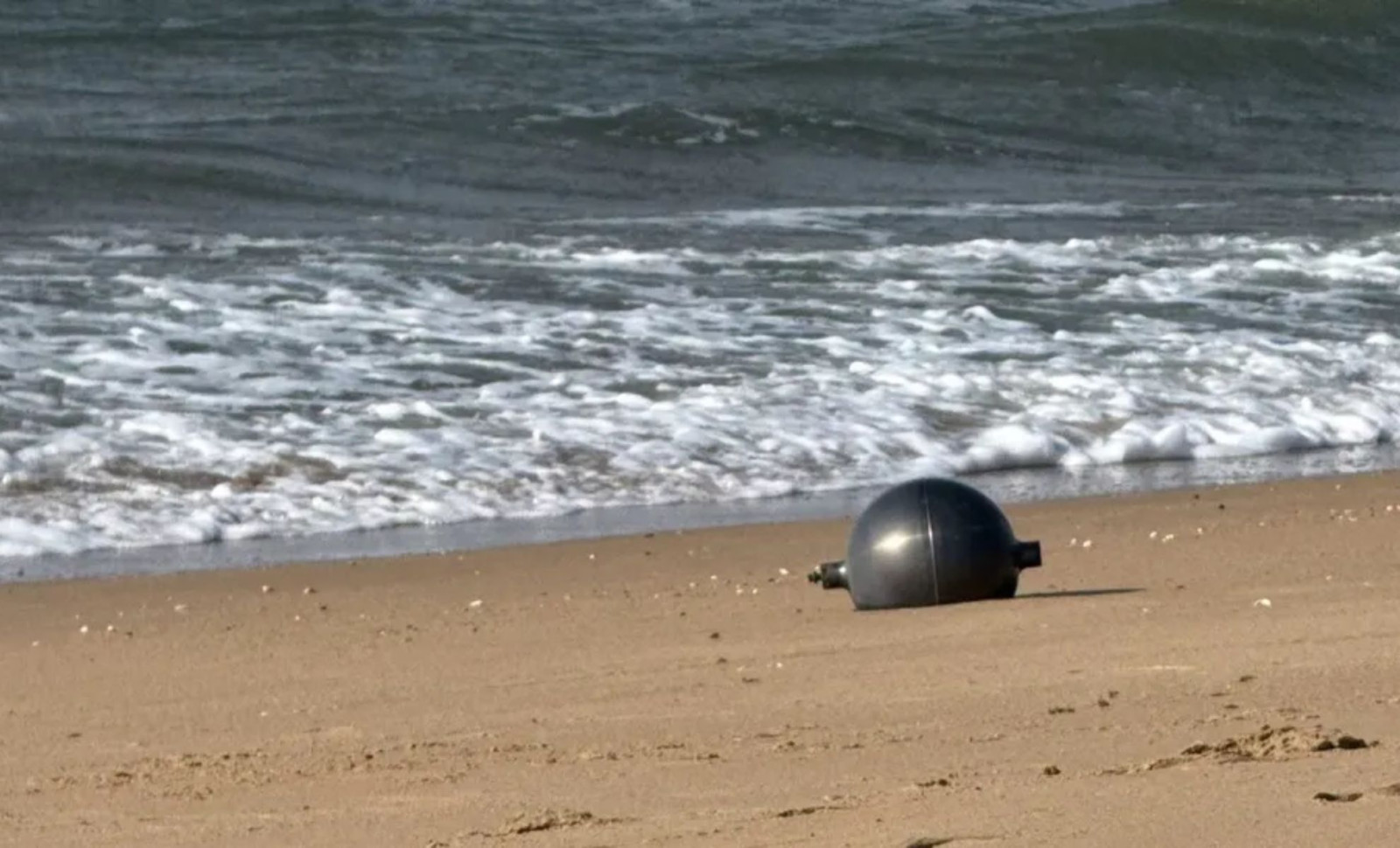 Mysterious Metal Spheres Found on Queensland Shore Linked to Rocket Debris 