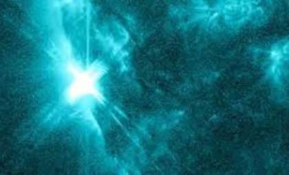 Returning Sunspot Cluster AR 3723 Erupts with Near X-Class Solar Flare