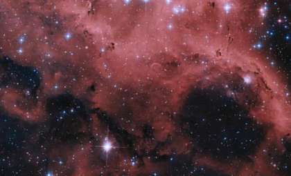 Hubble Reveals Majestic Gas Bubbles in Nearby Galaxy’s Star-Forming Region