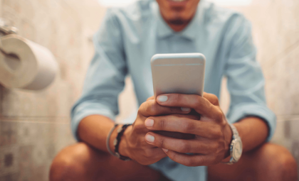 Expert Warns About the Hidden Health Hazards of Using Phones in the Bathroom