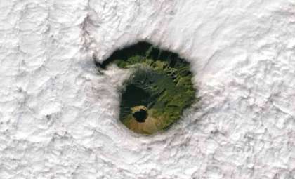 Mount Vesuvius Emerges Through an Enigmatic Hole in the Clouds