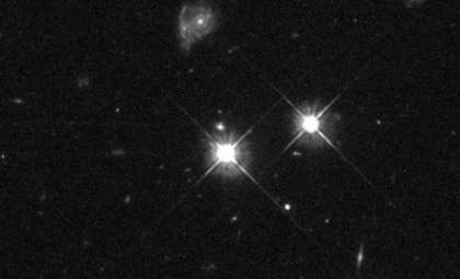 Hubble Celebrates 100,000th Image with Spectacular View of Quasar 9 Billion Light-Years Away