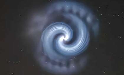 Mystifying Blue Spiral Dazzles European Night Sky: Rocket or Alien Activity?
