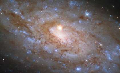 A Nearby Star Intrudes on Hubble’s Stunning Capture of a Faraway Galaxy