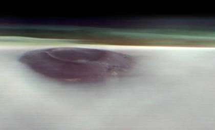 NASA Captures Stunning Image of Gigantic Formation Piercing Mars' Morning Clouds