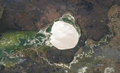 Astronaut Captures Striking Silver Reflection on Lake Iro in Chad, Possibly Linked to Meteor Impact