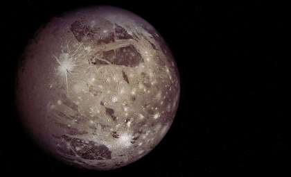Could the Solar System's Biggest Moon Reveal the Secrets of Dark Matter?
