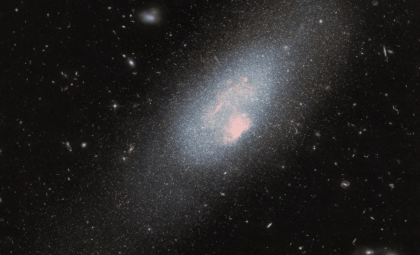 Hubble Reveals Intense Star Formation in Diminutive Galaxy 13 Million Light-Years Away