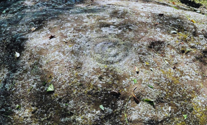 Ancient Boulder in Ohio Bears Mysterious Footprints and Symbols