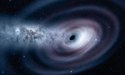 Supermassive Black Holes May Nurture Vast Planet Nurseries in Dusty Outer Disks