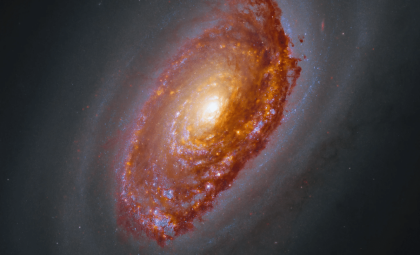 NASA Reveals Striking Image of Galaxy Bearing a Billion-Year-Old Cosmic Scar